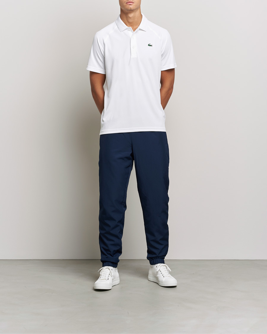 Lacoste track pants best sale navy