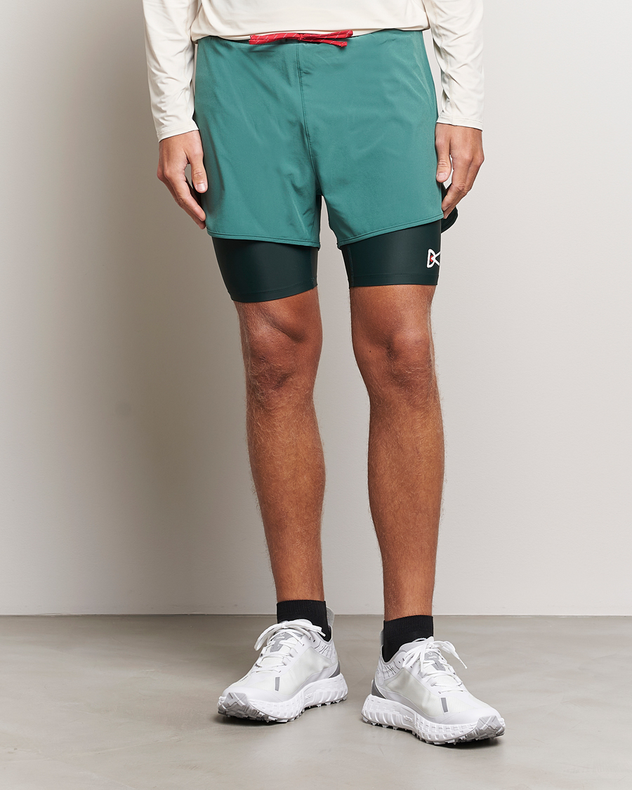 Heren |  | District Vision | Layered Pocketed Trail Shorts Pine
