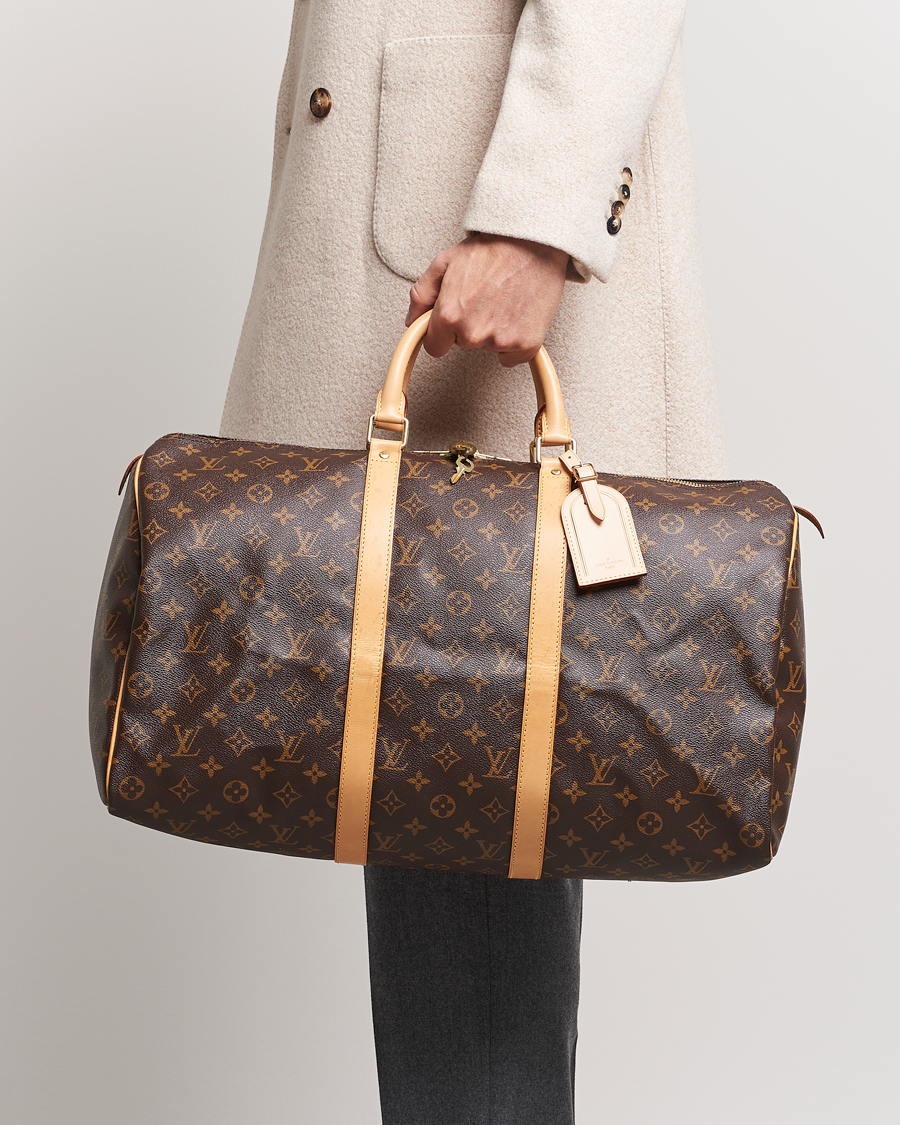 Louis Vuitton Pre-Owned Alizé 1 Poche Garment Travel Bag Monogram at CareOf