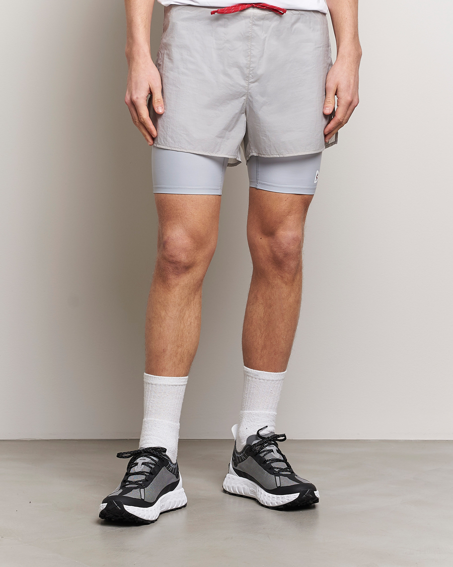 Heren | Korte broek | District Vision | Ripstop Layered Trail Shorts Moonbeam